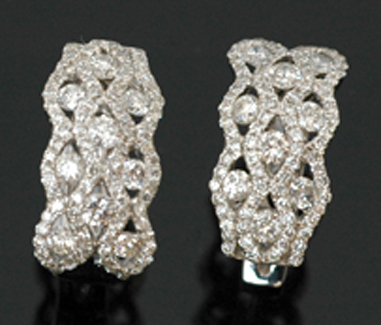 Appraisal: A pair of diamond dress earrings The huggie style earrings