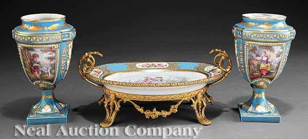 Appraisal: A S vres-Style Porcelain Garniture comprising a bronze-mounted platter with