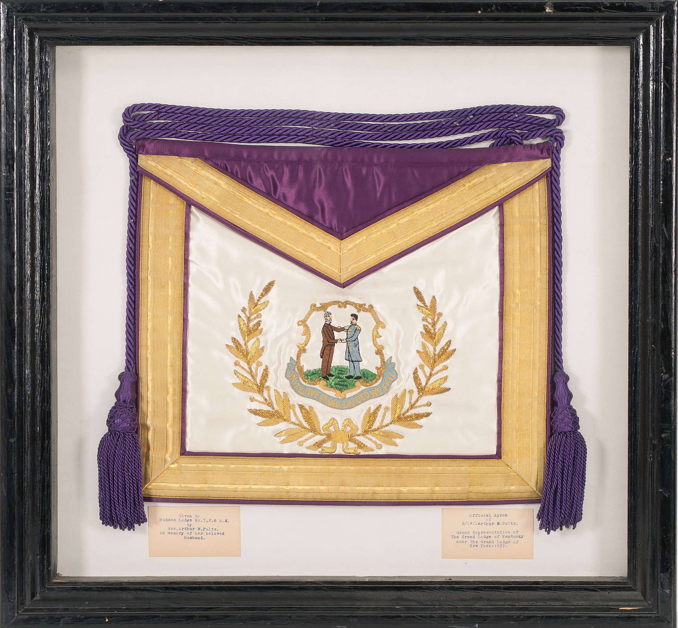 Appraisal: FRAMED MASONIC APRON White silk body and purple silk flap