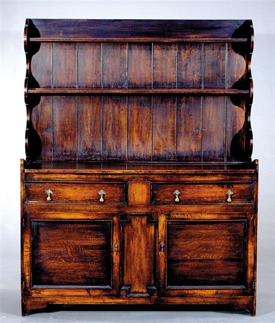 Appraisal: English oak Welsh dresser late th century open back with