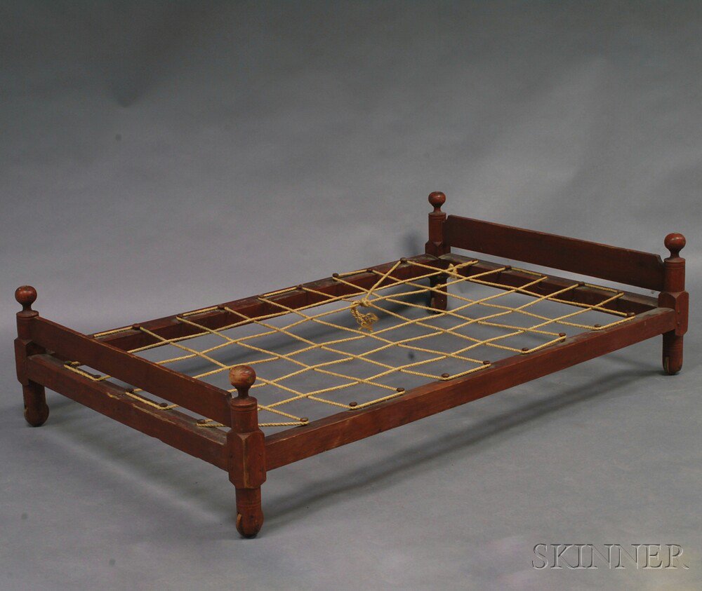 Appraisal: Red-painted Trundle Bed th century ht wd dp in Estimate