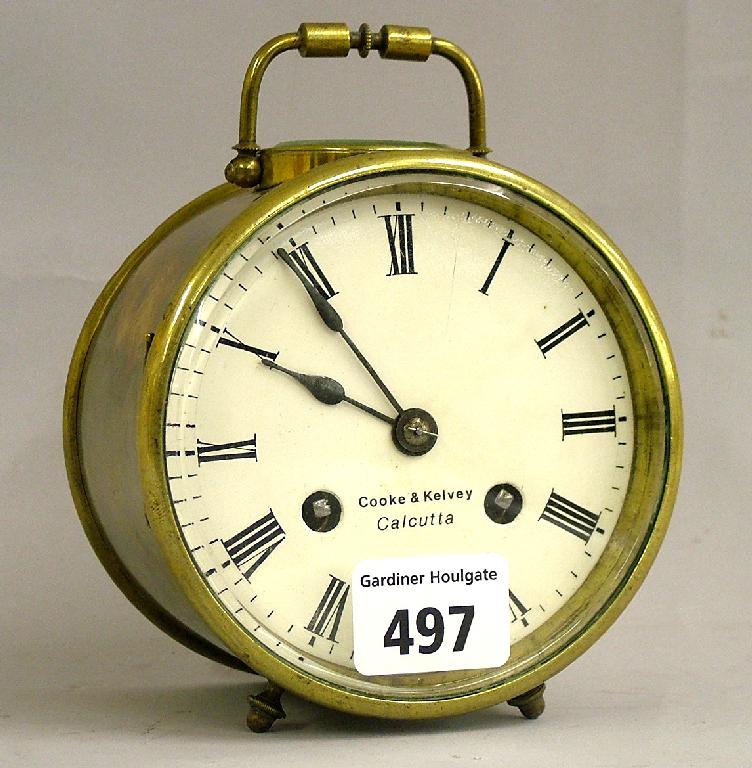 Appraisal: Drumhead two train travelling clock striking on a bell the