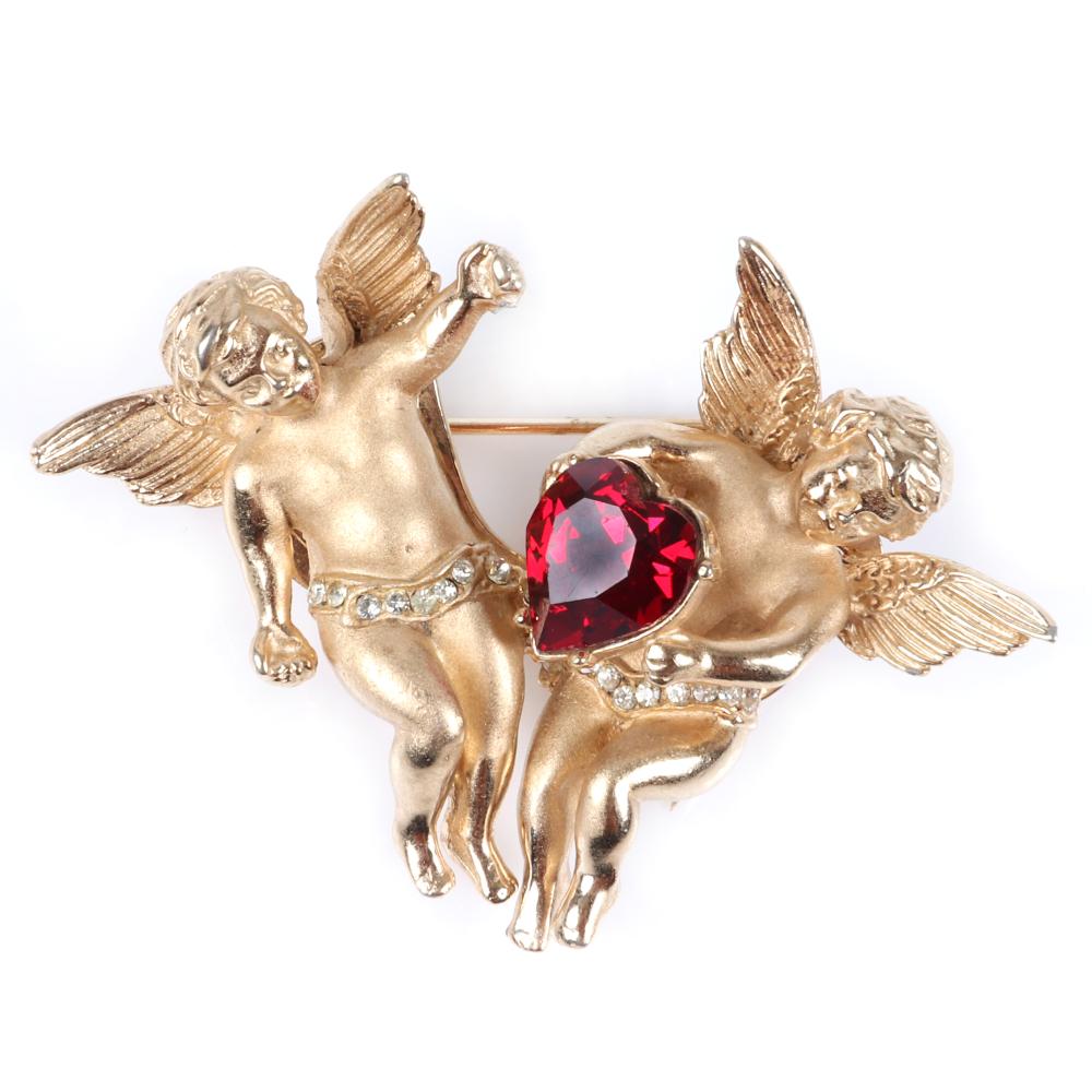 Appraisal: CORO DOUBLE CUPID CHERUB GOLD-TONE FIGURAL DUETTE PIN CLIP SET