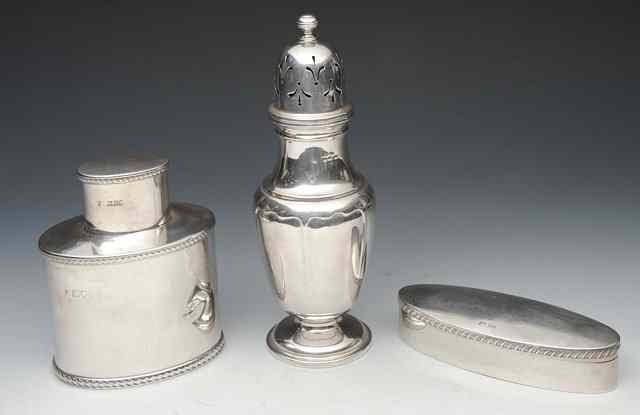 Appraisal: AN OVAL SILVER TEA CANISTER with gadroon banded decoration together