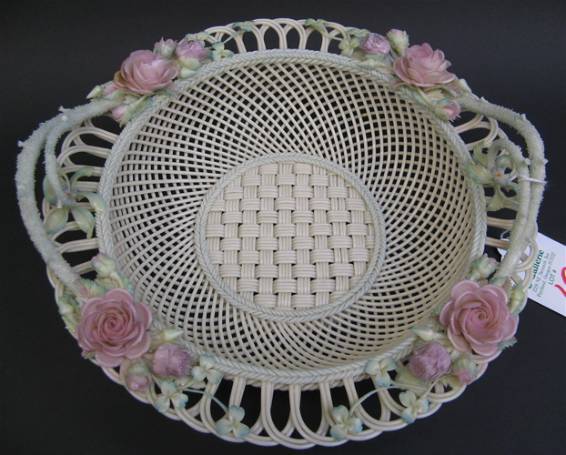 Appraisal: IRISH BELLEEK FOUR STRAND ROUND BASKET having painted roses and