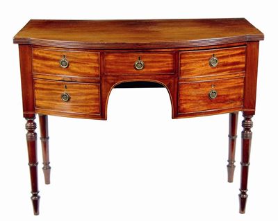 Appraisal: A th century bowfront sideboard the reeded edge top above