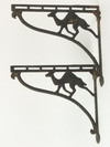 Appraisal: SHELF BRACKETS - Pair of figural cast iron wall mounted