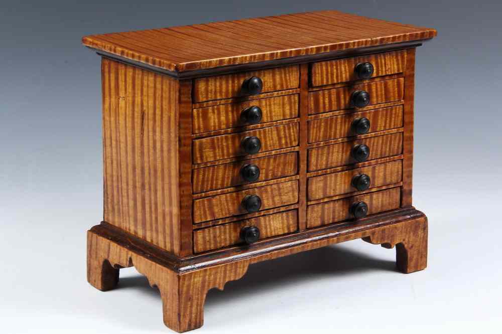 Appraisal: MINIATURE DRESSER - Chippendale Curly Maple Miniature Jewel Chest having