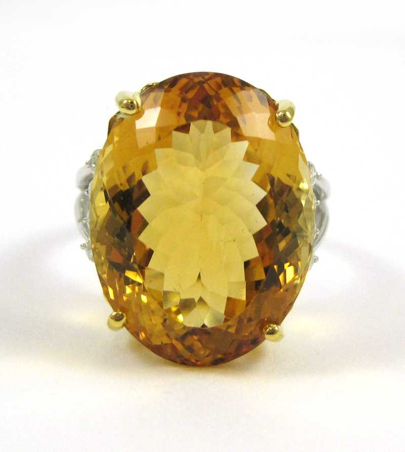 Appraisal: CITRINE AND DIAMOND KARATE WHITE AND YELLOW GOLD RING the