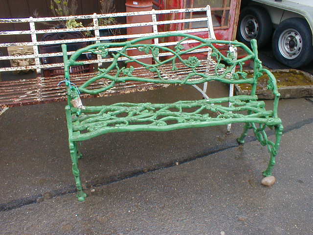 Appraisal: A Victorian cast iron rustic garden bench wide -