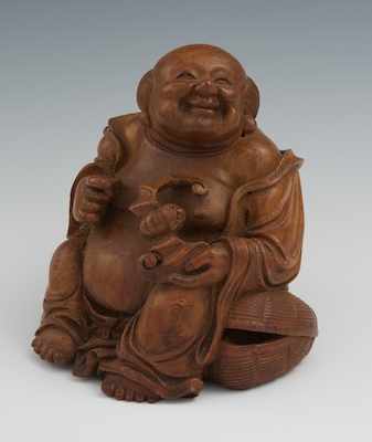 Appraisal: A Chinese Carved Hotei with Bat Carved bamboo Hotei depicted