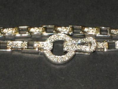 Appraisal: A DIAMOND BRACELET comprising oblong ct white gold links set