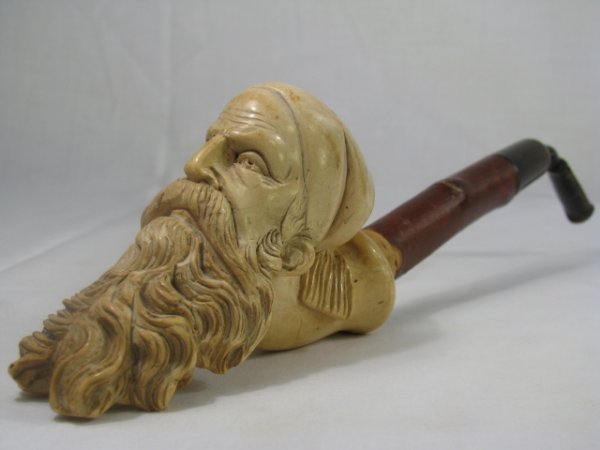 Appraisal: Meerschaum carved pipe bowl of bearded man wear a cap