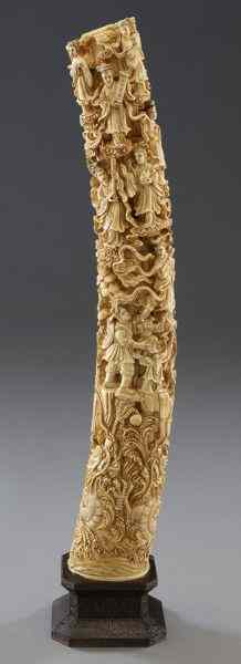 Appraisal: Chinese carved ivory tusk depicting immortals International buyers should note