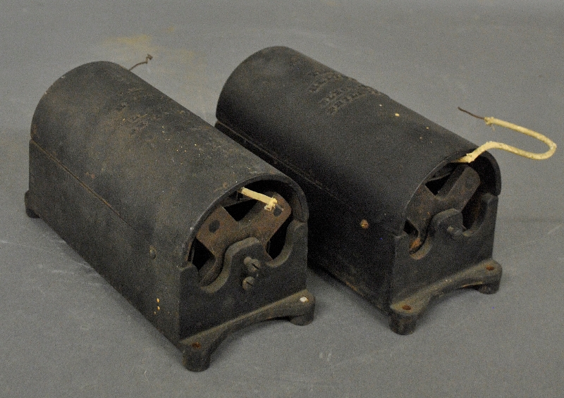 Appraisal: - Two cast iron cased batteries The Helios Elect Co