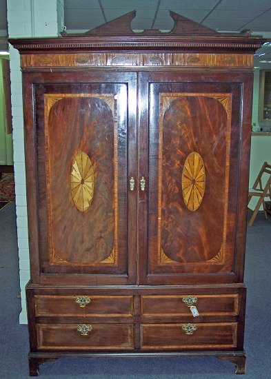 Appraisal: A late th Century inlaid mahogany linen press originally with