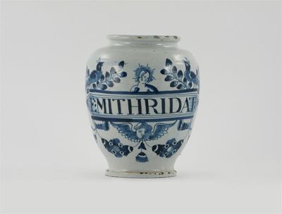 Appraisal: A delftware dry drug jar painted in blue with the