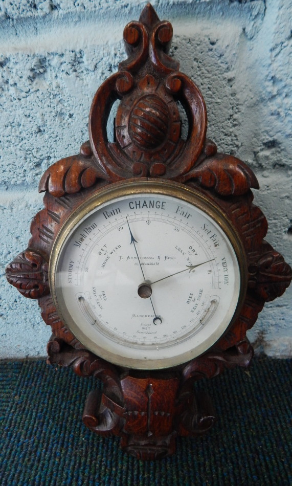 Appraisal: A small early thC aneroid barometer the dial stamped T