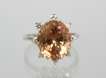 Appraisal: A Ladies' Topaz and Diamond Ring k white gold ring