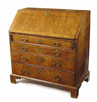 Appraisal: A George I walnut bureau cross and feather banded overall