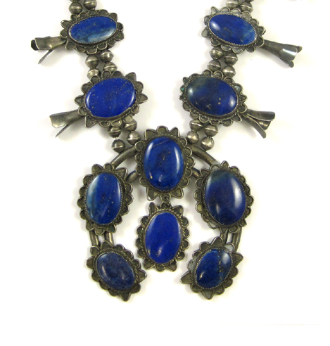 Appraisal: LAPIS LAZULI AND SILVER SQUASH BLOSSOM NECKLACE eighteen polished lapis