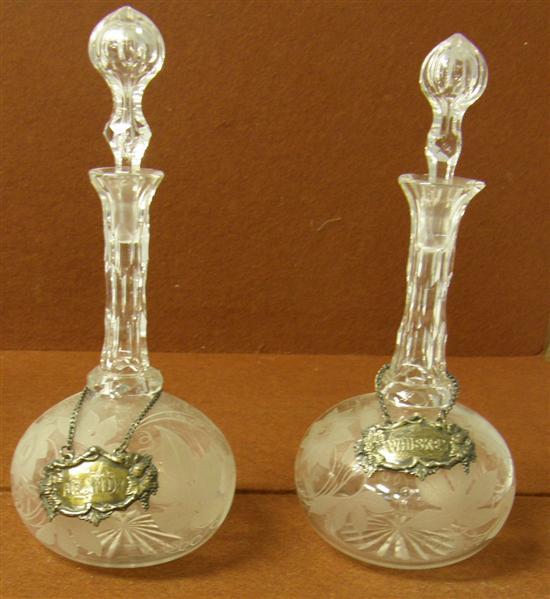 Appraisal: Pair of th century decanters with cut and engraved necks