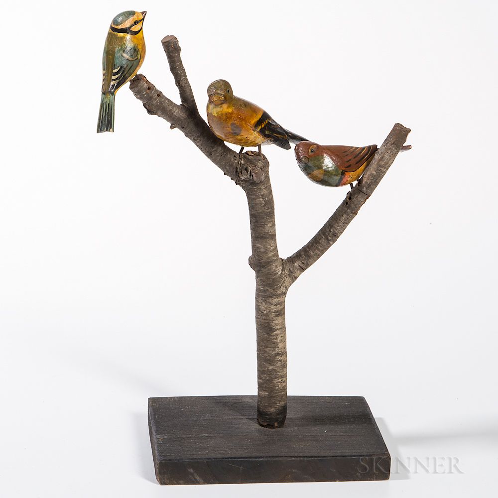 Appraisal: Three Carved and Painted Birds Mounted on a Branch Tree