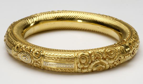 Appraisal: AMERICAN ART NOUVEAU GOLD BANGLE k gold deeply engraved hinged