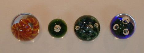 Appraisal: A Caithness Triple Crown Cobalt paperweight three further paperweights