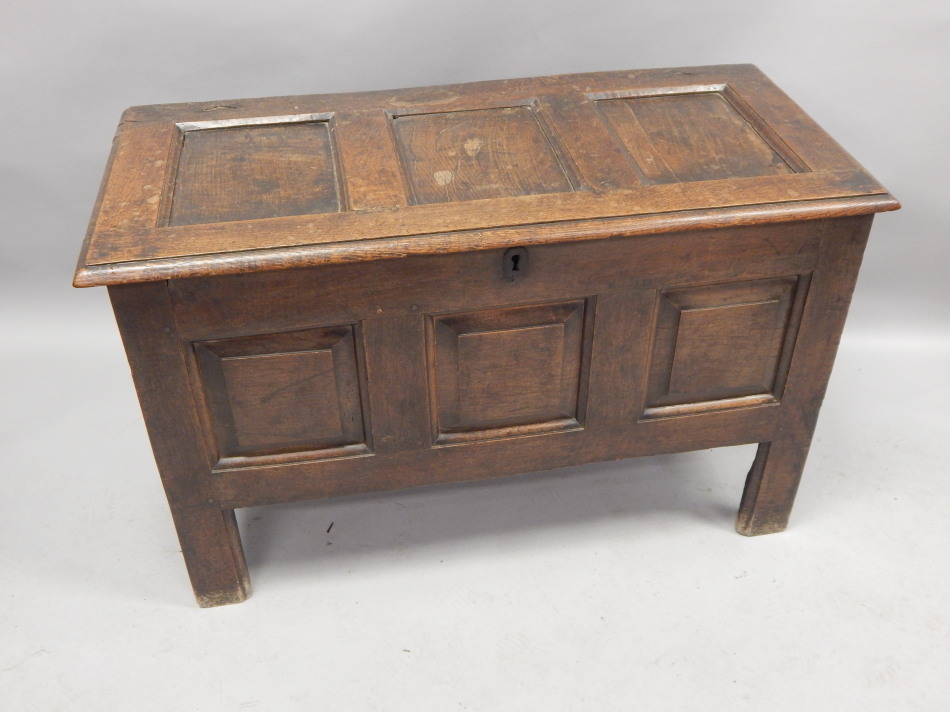 Appraisal: An early thC late thC panelled oak coffer on stile