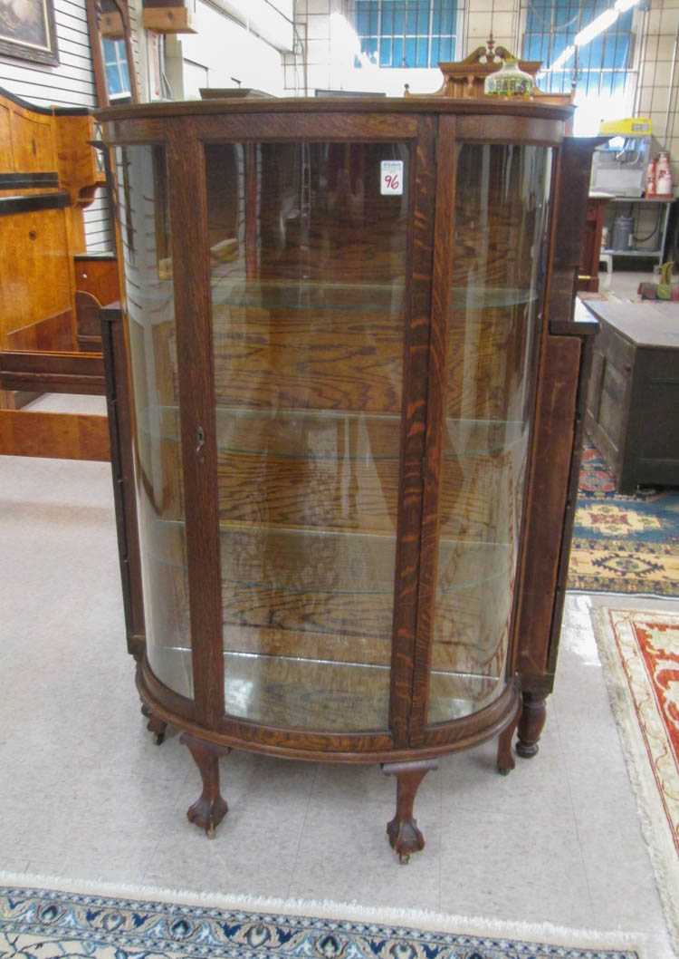 Appraisal: LATE VICTORIAN OAK AND CURVED GLASS CHINA CABINET American c