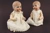 Appraisal: DOLLS - Pair of bisque head composition body twin baby