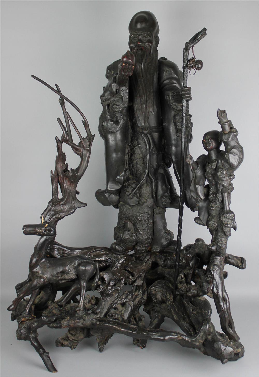 Appraisal: LARGE CHINESE ROOTWOOD FIGURE OF SHOULAO ON STAND the deity