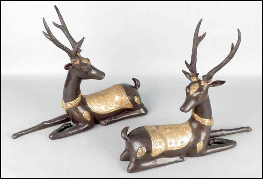 Appraisal: PAIR OF PATINATED PAINTED BRONZE DEER th Century unmarked Ht