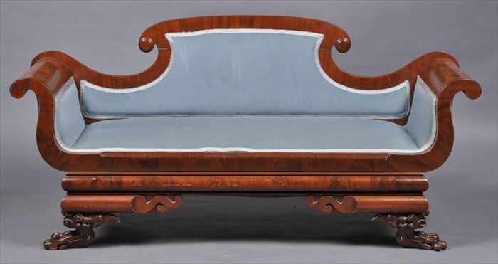 Appraisal: AMERICAN CLASSICAL CARVED MAHOGANY SETTEE The padded back with raised