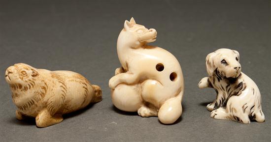 Appraisal: Three Japanese or Chinese carved ivory netsukes first half- th