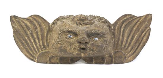 Appraisal: Sale Lot A Continental Carved Limewood Cherub Mask set with