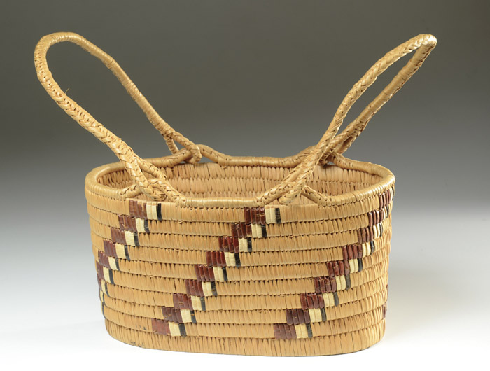 Appraisal: SALISH INDIAN DOUBLE-HANDLED BASKET having diagonal white black and cherry