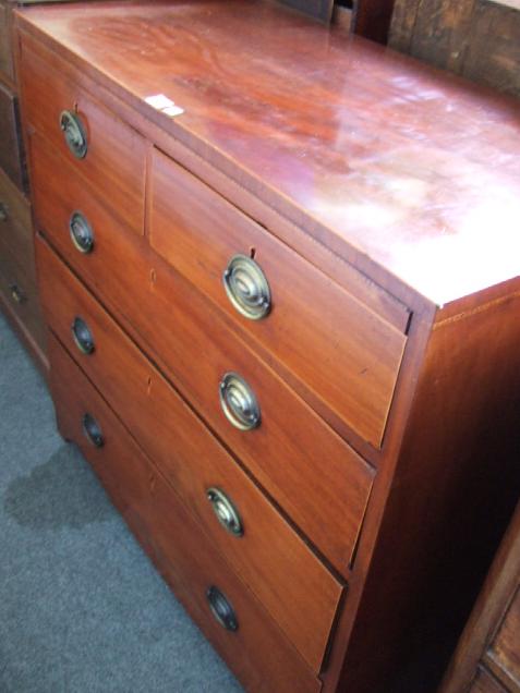 Appraisal: A George III mahogany chest of two short and three