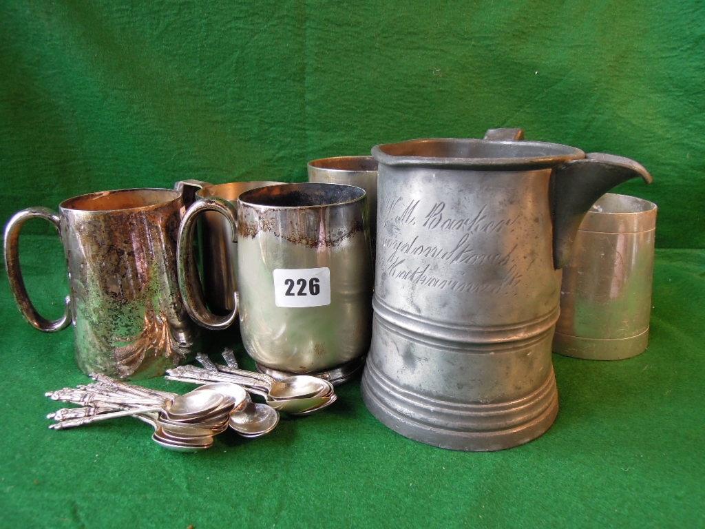 Appraisal: A th century pewter quart measure five plated tankards and