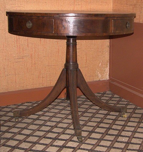 Appraisal: Title Mahogany Drum Table with tooled red leather round top