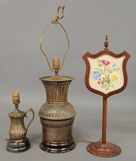 Appraisal: Two metal lamps h h and a crewelwork shield with