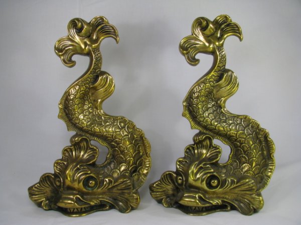 Appraisal: Pair of brass dolphin andirons each measuring high by wide