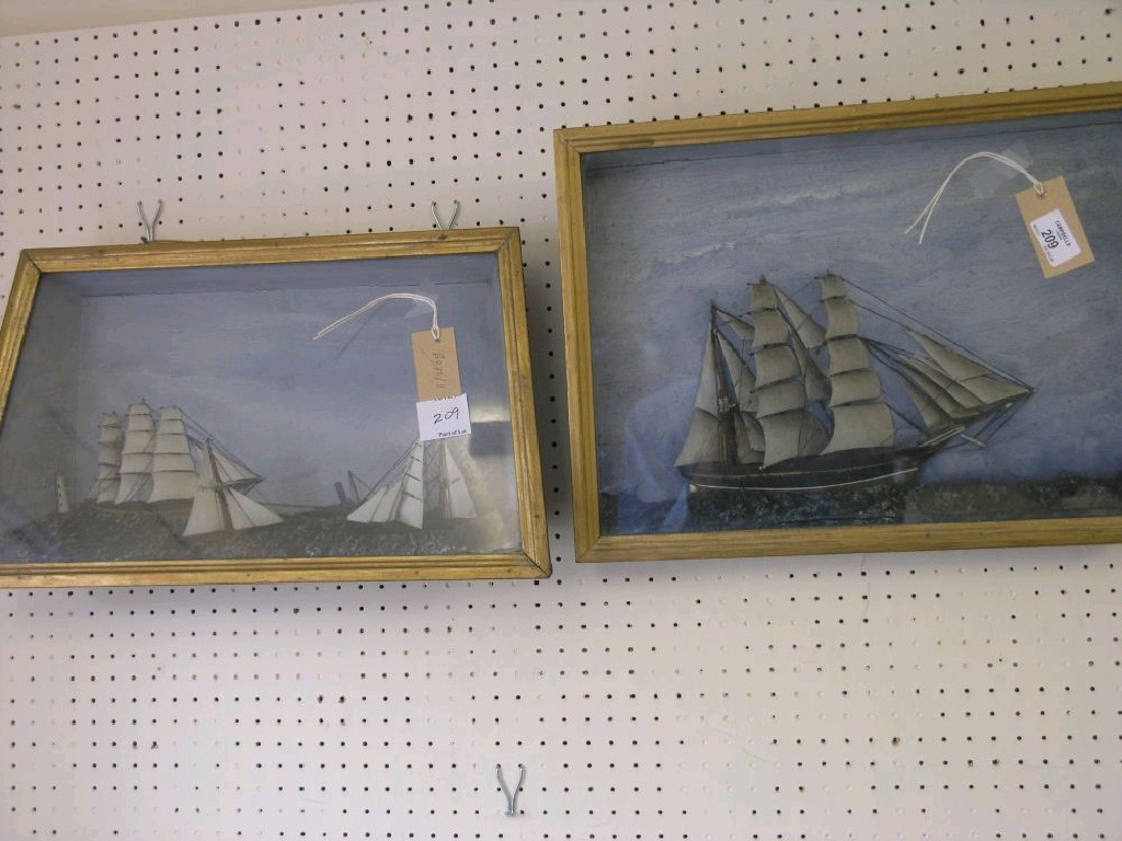 Appraisal: Two Victorian wall hanging painted wood boat models one cabinet