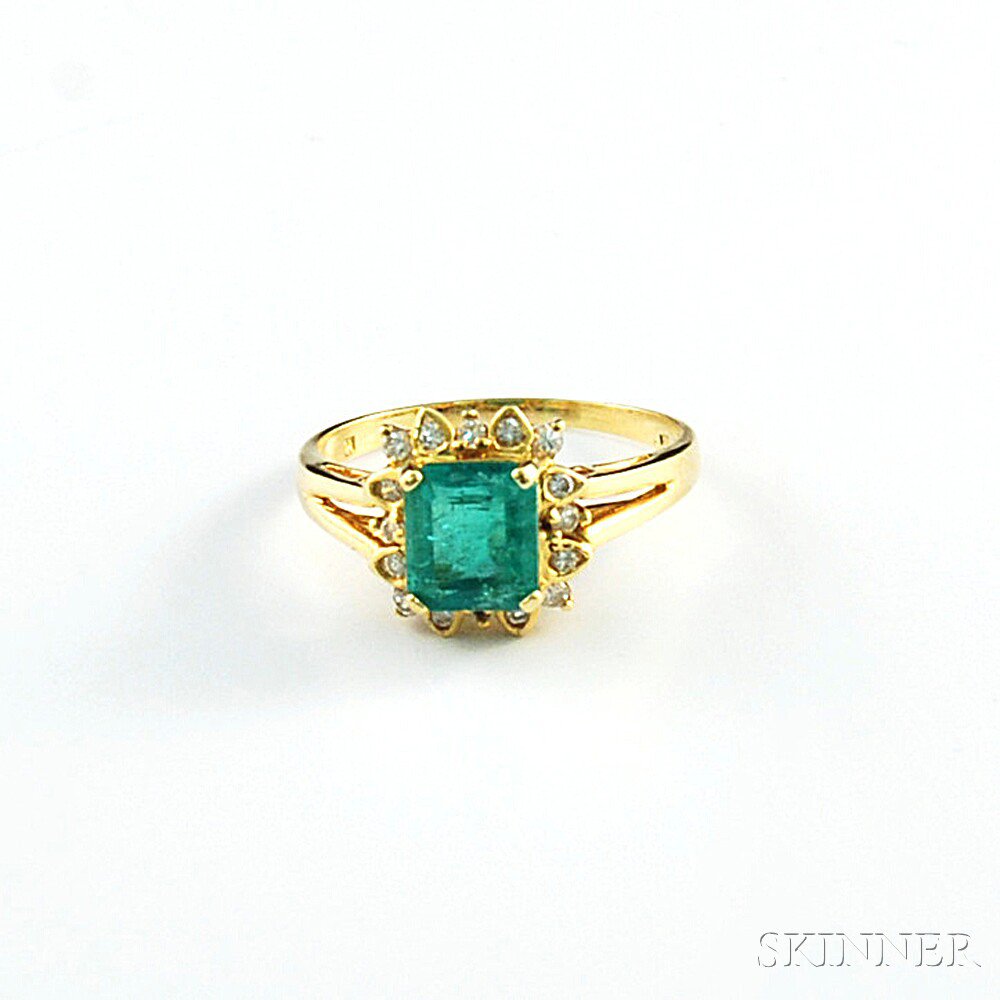 Appraisal: kt Gold Emerald and Diamond Ring centering an emerald-cut stone