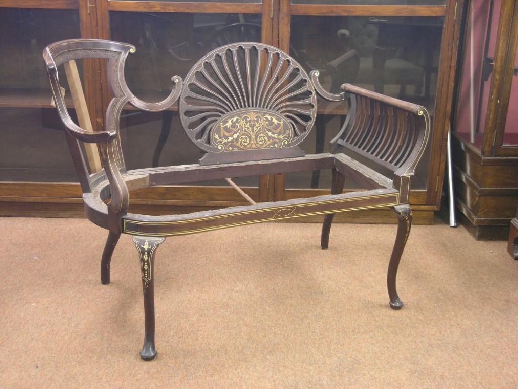 Appraisal: An unusual Edwardian Art Nouveau two-seater settee asymmetrical-shape with fan