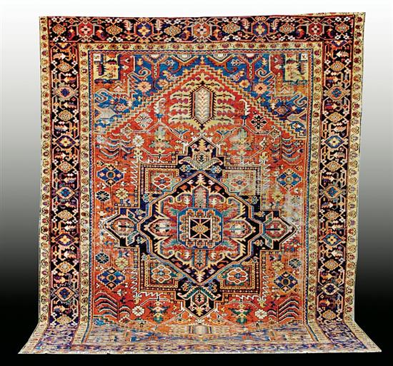 Appraisal: Persian Heriz carpet circa s ' x ' Lacking to