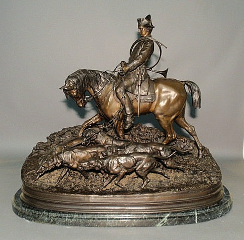 Appraisal: Bronze figural group after J P Men Valet de Chasse