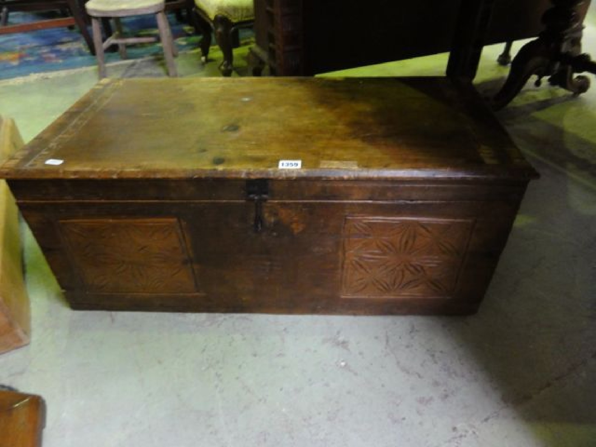 Appraisal: A vintage stained pine box with hinged lid and scratched