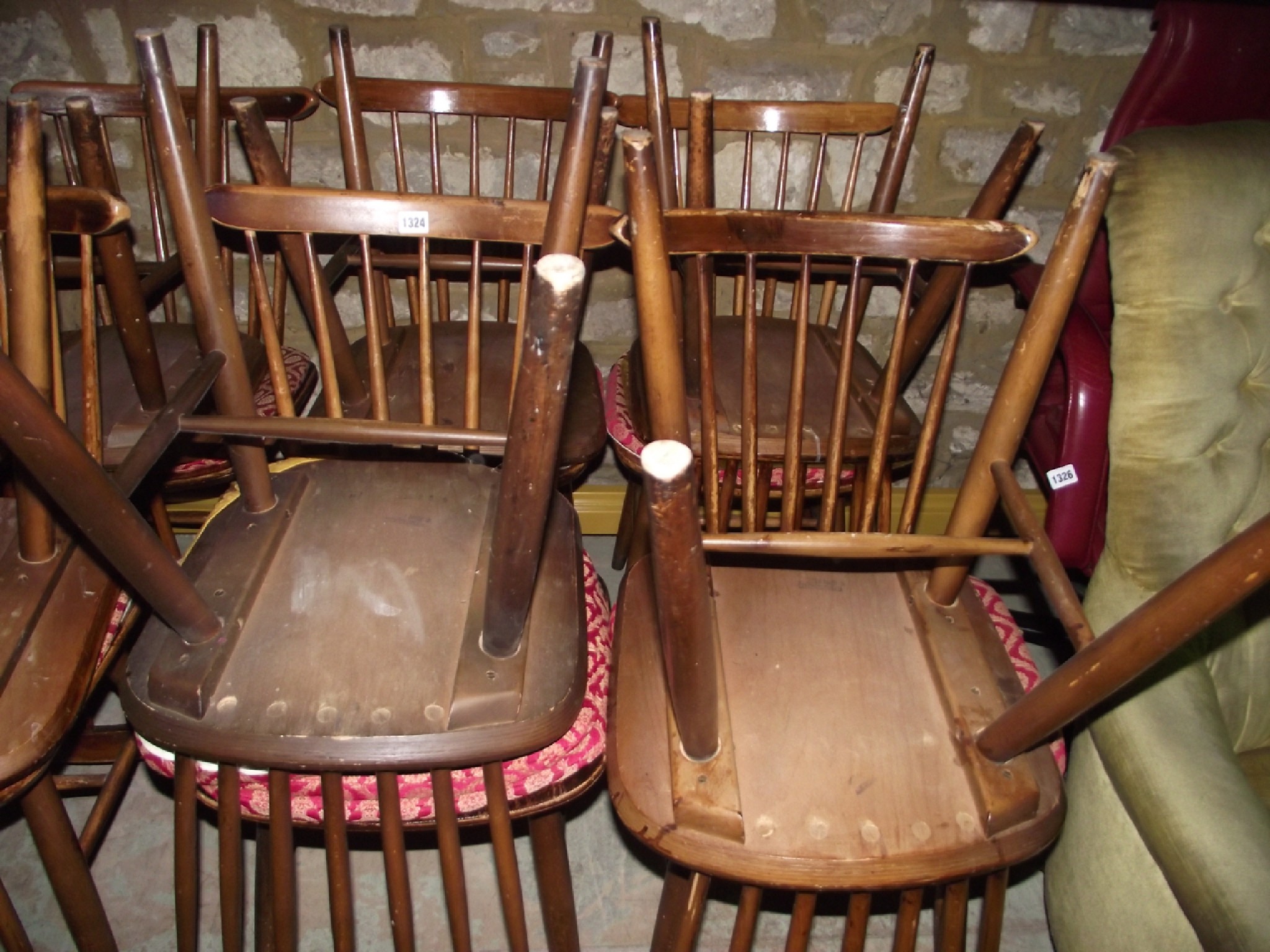 Appraisal: A set of eight Ercol style stained beech wood stick